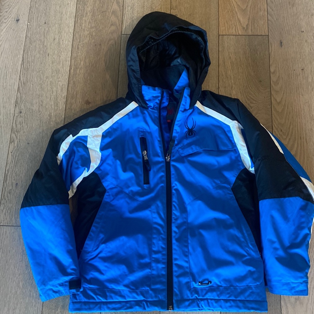 Spyder boys ski jacket blue, black and white size 12.